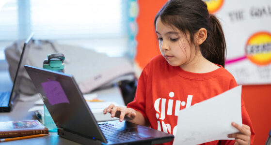 Young girls using a laptop